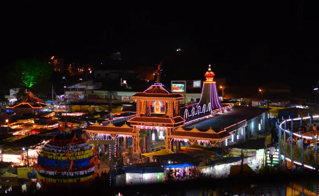 a group of colorful buildings with lights, Unique Wonders of India